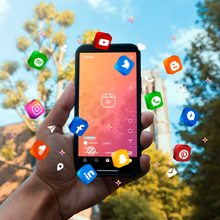 Social media icons around the smartphone representing digital marketing with LEOGN social media services